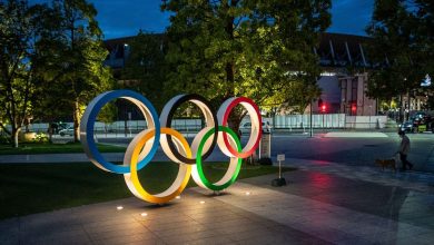 The Olympic rings are seen lit outside the Japan Olympic Museum in Tokyo on May 17. The International Olympic Committee has announced new framework on transgender athletes, saying that no athlete should be excluded from competition on the assumption of an advantage due to their gender.