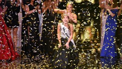 Miss Alaska Emma Broyles reacts as she is crowned by the 2020 Miss America, Camille Schrier, after winning the Miss America competition on Dec. 16, 2021, at Mohegan Sun in Uncasville, Connecticut.