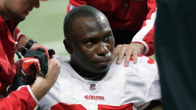 In this 2010, file photo, San Francisco 49ers cornerback Phillip Adams (35) is attended to after injuring his left leg in a game against the St. Louis Rams.