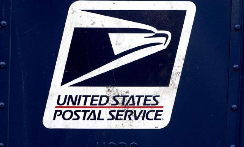 A U.S. Postal Service logo is pictured on a mail box in the Manhattan borough of New York City on Aug. 21, 2020.