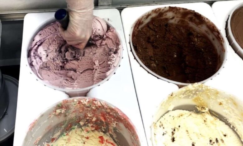 The lines, for much of Friday, were out the door as Aggie Ice Cream celebrated 100 years of scooping up frozen treats with $1 cones.