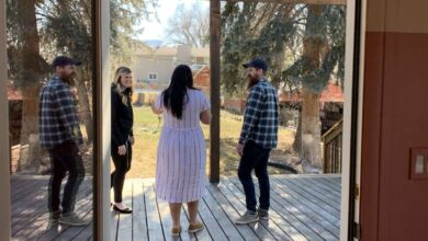 Designer Candis Meredith, left; homeowner Aubry Bennion, center; and Andy Meredith are pictured on Bennion's porch at her Bountiful home in this undated photo during her renovation in which she contracted the Merediths to oversee the work.
