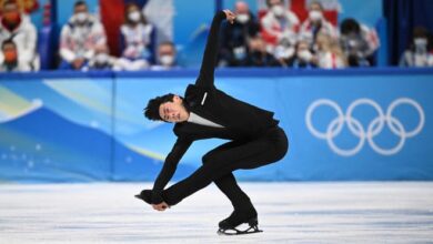 American Nathan Chen competes in the men's short program of the figure skating team event during the 2022 Winter Olympics.