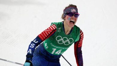 Jessie Diggins celebrates winning the gold medal in the women's cross-country skiing team sprint freestyle final during the 2018 Pyeongchang Olympics.