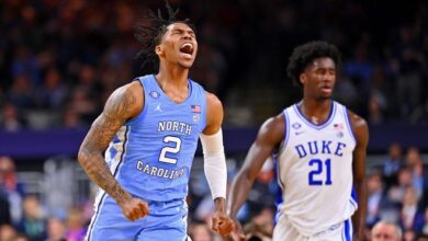 North Carolina Tar Heels guard Caleb Love (2) reacts after a play against the Duke Blue Devils during the first half during the 2022 NCAA men's basketball tournament Final Four semifinals at Caesars Superdome.