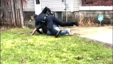 A screen capture from a video released from the Grand Rapids Police Department on April 13, 2022, shows the moments before a shot was fired following a traffic stop involving Patrick Lyoya in Grand Rapids on April 4, 2022, that resulted in a shooting that fatally wounded Lyoya.